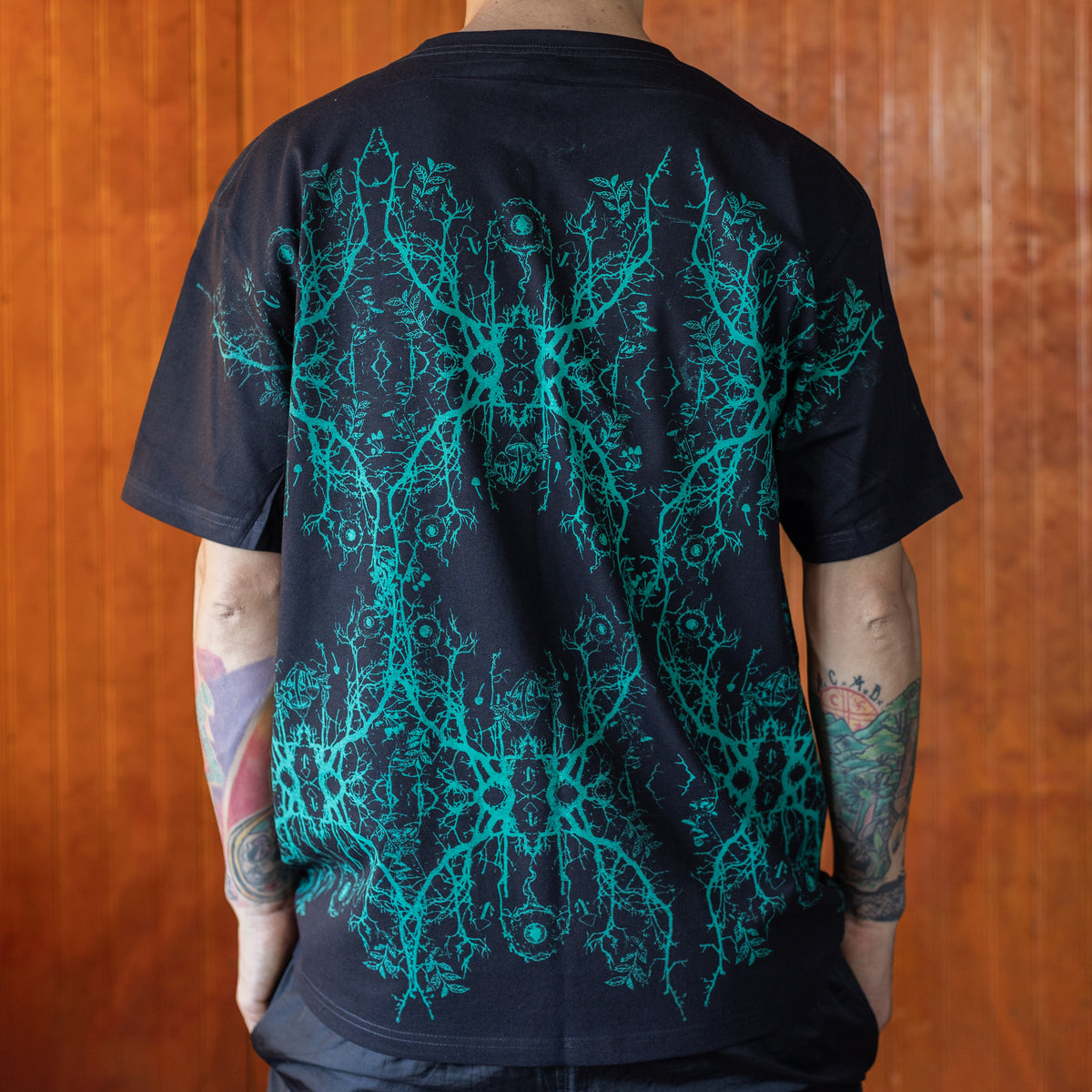 POLERA MANGA CORTA HOMBRE NEGRO / TURQUESA