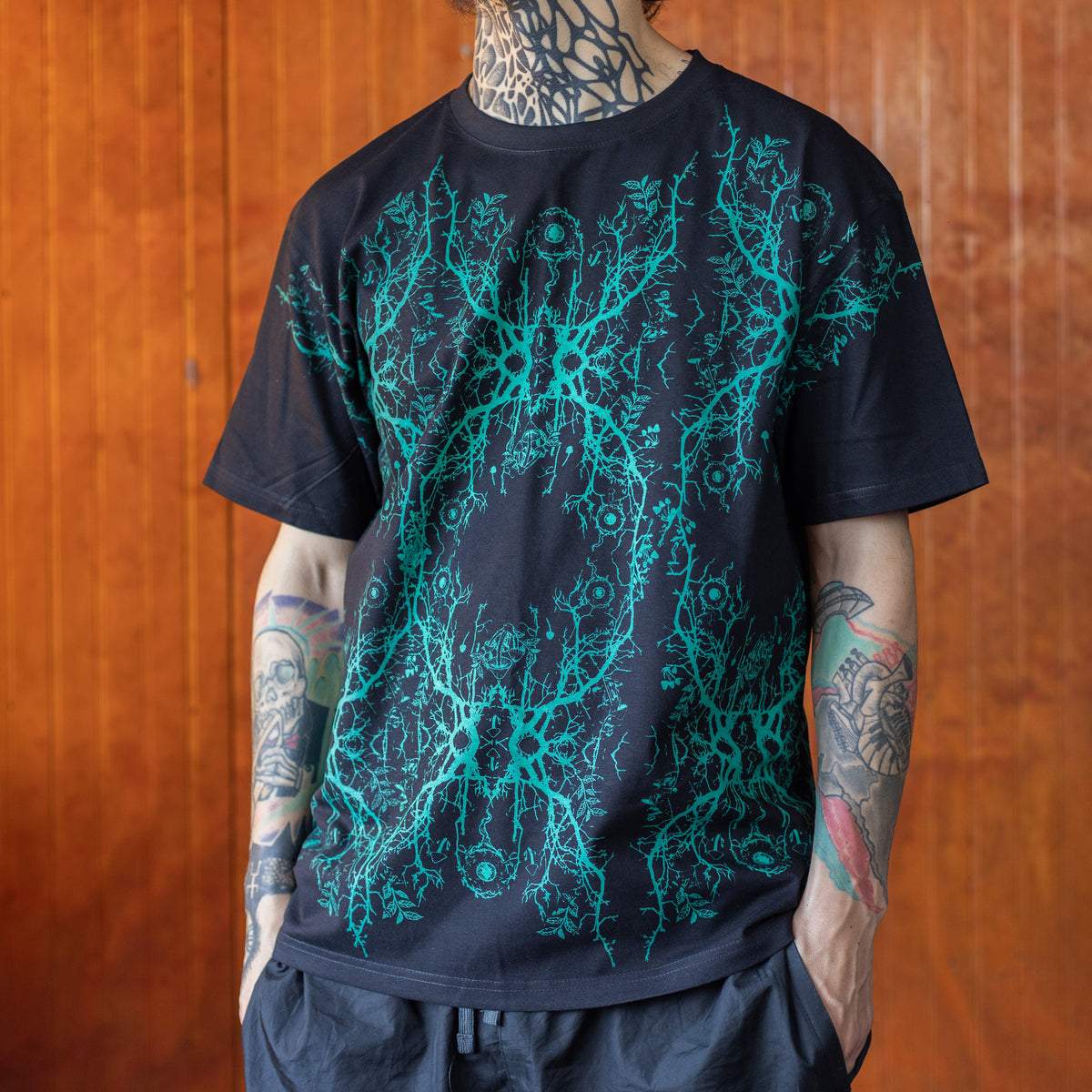 POLERA MANGA CORTA HOMBRE NEGRO / TURQUESA